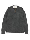 A Tentative Atelier sweater with cable-knit pattern