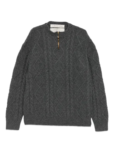 A Tentative Atelier sweater with cable-knit pattern