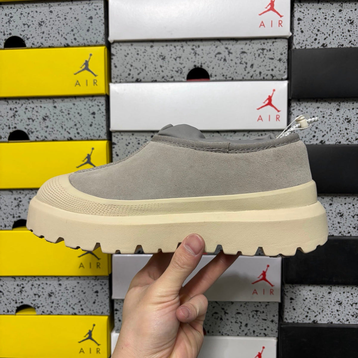 UGG Neumeel Deco Slip-On – Suede Moccasin Sneaker with Cream Lug Sole & Reflective Drawstring in Grey
