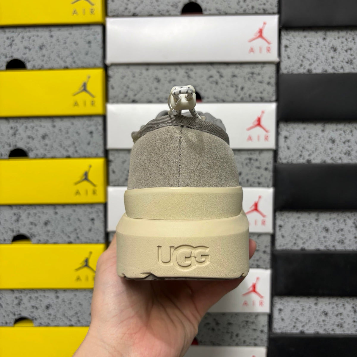 UGG Neumeel Deco Slip-On – Suede Moccasin Sneaker with Cream Lug Sole & Reflective Drawstring in Grey