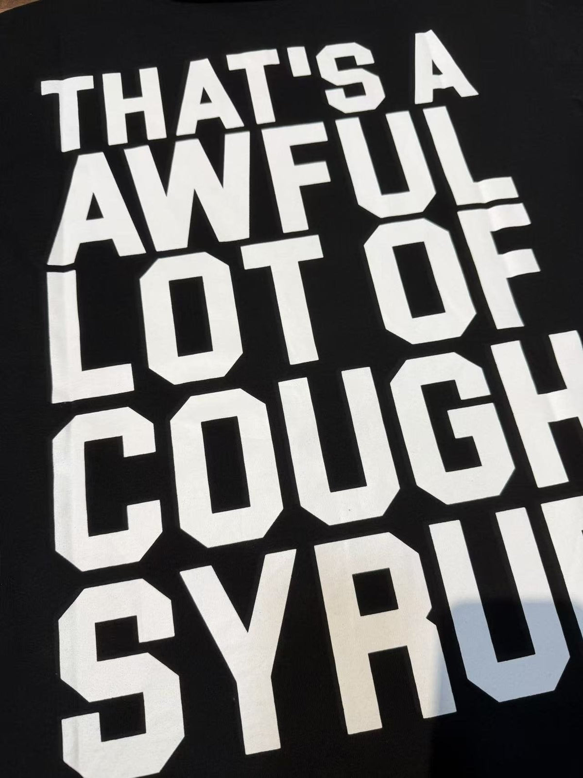 THAT'S A AWFUL LOT OF COUGH SYRUP White & Blue Graphic T-Shirt