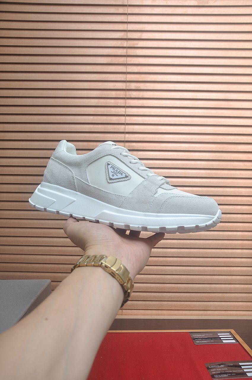Prada Triangle Plaque Low-Top Sneakers - Lace-Up Closure